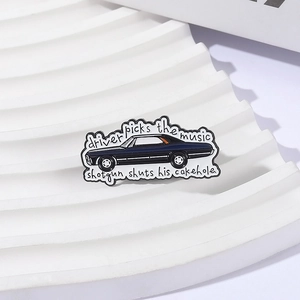 Classic black car enamel pin with driver picks the music quote on white geometric stands