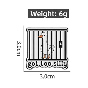 Detailed size and weight view of a cute goose enamel pin with 'got too silly' text