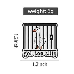 Detail showing 1.2 inch Silly Goose enamel pin with got too silly text and 6g weight