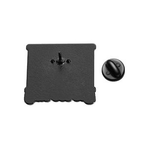 Detail of metal pin back with textured surface and black rubber clutch for enamel pins