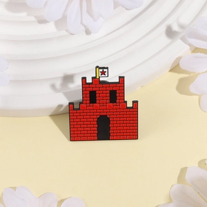 Retro red castle enamel pin with yellow flag and black brick pattern in gaming style