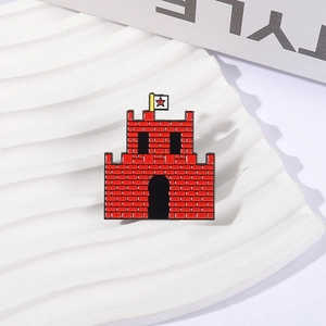 Cartoon red castle enamel pin with a white star flag on a white textured background