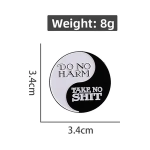 Macro detail of 3.4cm round enamel pin with motivational yin yang design and 8g weight