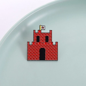 Creative red castle enamel pin with brick texture and star flag on a ceramic plate