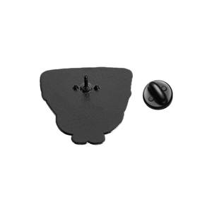 Detail view of the black metal badge back with needle pin and rubber clutch attachment