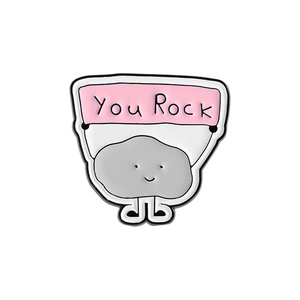 Cartoon rock enamel pin with You Rock pink banner message for backpack decoration
