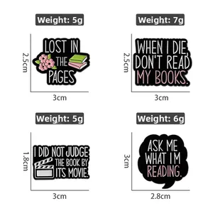 Detailed size chart for four enamel book brooches with English quotes and zinc alloy design
