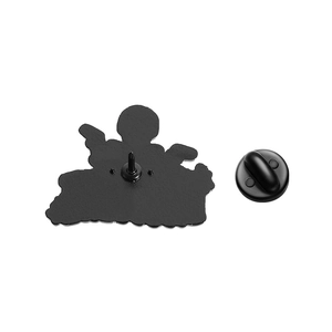 Detail of metal pin back with black rubber clutch for enamel skeleton badge accessory