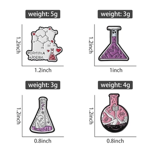 Detailed view of four science enamel pins showing exact weights and dimensions for each piece