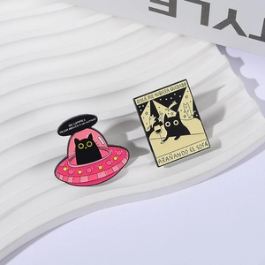 UFO black cat enamel pin set with cartoon spaceship and poster design badges