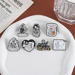 Set of 7 spooky skeleton enamel pins with black and white artistic comic designs