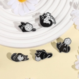 Cartoon black cat enamel pins set with D20 dice for tabletop gaming fans and accessory lovers