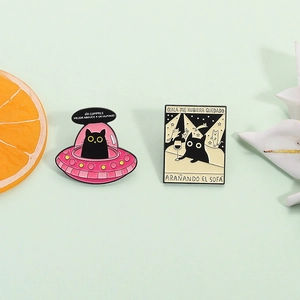 Cute UFO black cat enamel pins and cartoon dancing cat badges in minimalist style