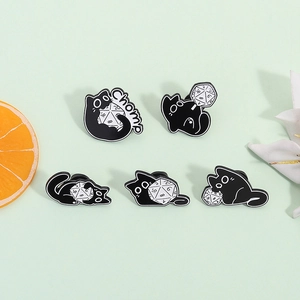 Set of five creative black cat enamel pins featuring d20 dice in various playful poses