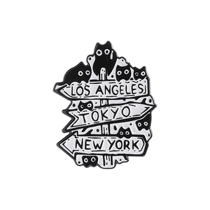 Halloween cat enamel brooch featuring Los Angeles Tokyo and New York city signs