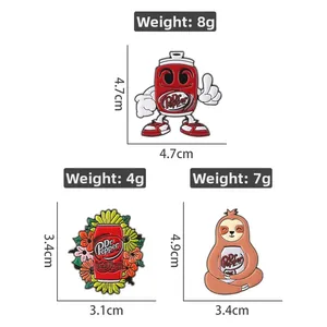 Enamel pins featuring Dr Pepper soda cans and sloth design with weight and size measurements