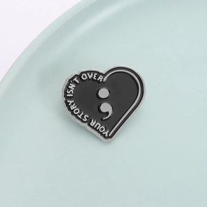 Semicolon heart enamel pin with Your Story Isn't Over quote for backpacks