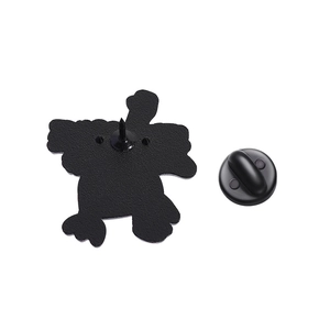 Detail view of the black matte enamel pin back with a secure metal butterfly clutch