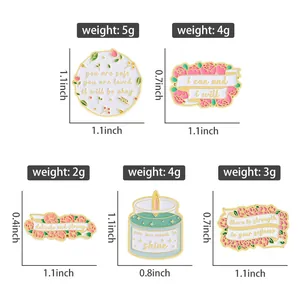 Size chart showing motivational enamel pins including flowers and candles dimensions