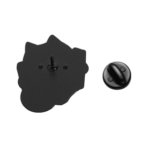 Detailed back view of a black enamel book pin with a rubber butterfly clutch and pin needle