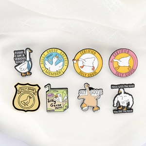 Set of 8 creative cartoon enamel pins featuring silly goose and muscular duck designs