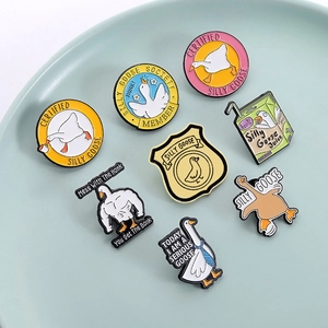 Set of 8 creative cartoon enamel pins featuring silly goose designs in various funny poses