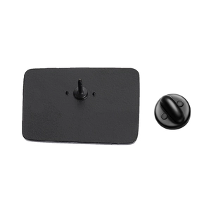 Detailed back view of the alloy brooch featuring the metal pin and black rubber clutch