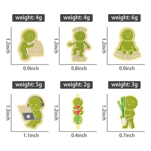 Close-up of green Smiski enamel pins in six poses for backpacks and clothing