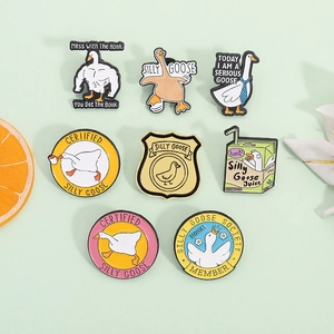 Funny goose enamel pins set including muscle goose and drink motifs for clothing decor