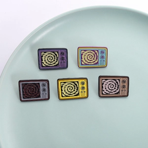 Set of five colorful retro television enamel pins with vintage spiral screen designs