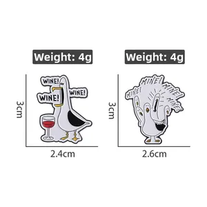 Detail showing dimensions and 4g weight of Seagull enamel pins with Wine and Mine text