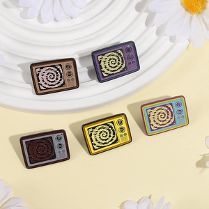 Set of 5 vintage TV enamel pins with colorful swirling screens and retro knob details