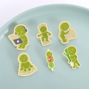 Set of 6 cute green enamel pins featuring funny cartoon characters in various poses