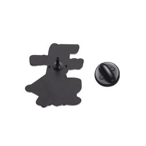 Detail view of the black matte enamel pin back showing the needle and rubber clutch closure