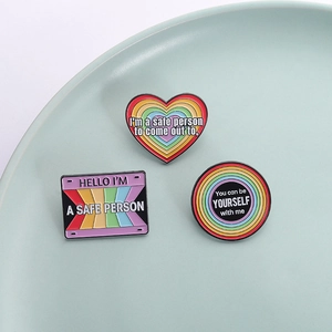 Rainbow enamel pin set with heart, circle, and rectangle shapes for LGBTQ support