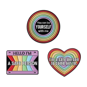 Rainbow enamel pin set with inclusive slogans heart and rectangle badges on white background
