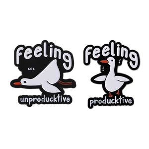 Cartoon goose enamel pins set with productive wordplay in black and white finish