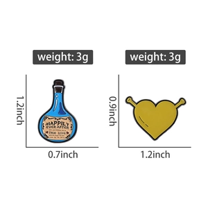 Detail view of Shrek-themed potion bottle and heart enamel pins with size measurements