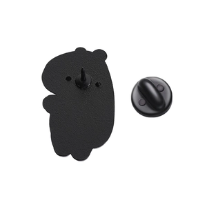 Detail view of the black matte enamel pin back featuring a sturdy rubber clutch and metal pin
