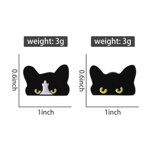 Detailed size view of black cat enamel pins showing 3g weight and 1 inch dimensions