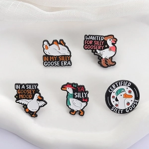 Set of 5 cartoon white goose enamel pins with humorous slogans on white display base
