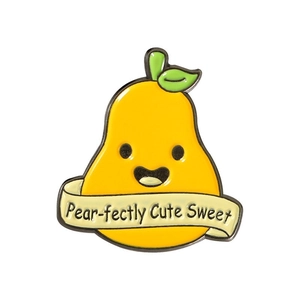 Detailed view of yellow pear enamel pin featuring green leaves and cute pun engraving