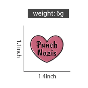 Detailed view of pink heart enamel pin showing weight 6g and dimensions 1.1x1.4 inches