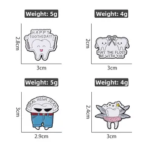 Detailed view of four cute enamel tooth pins with funny dental hygiene quotes