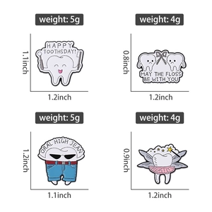 Detailed view of four cartoon tooth enamel pins with precise dimensions and weights