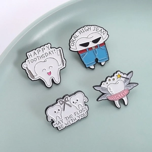 Cartoon tooth enamel pin set with dental hygiene puns on a ceramic tray for dentists