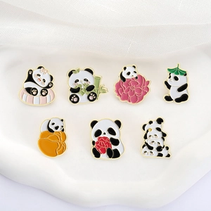 Set of cute cartoon panda enamel pins featuring bamboo and flowers for clothing decor