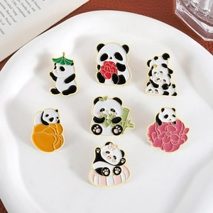 Set of 7 colorful cartoon panda enamel pins featuring lion dance and traditional Chinese motifs
