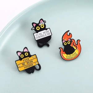Three-piece set of funny black cat enamel pins featuring humor quotes and fire design