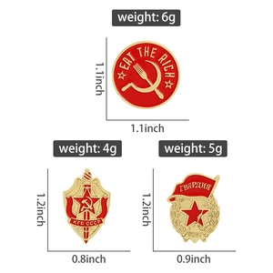 Detail view of retro CCCP enamel pins including KGB shield and Eat The Rich badge